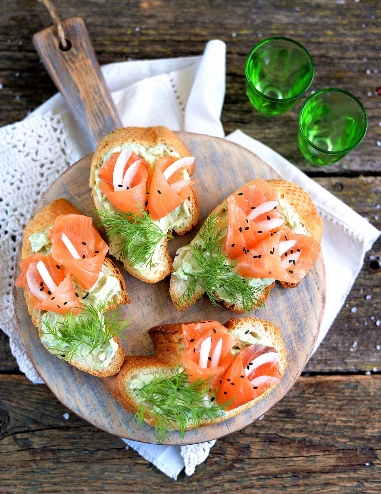 homemade-sandwiches-with-avocado-pasta-lightly-salted-salmon-cutting-board-rustic-style (1)